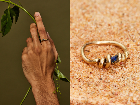 A golden vine wraps around a rectangular blue Australian sapphire and creates a ring