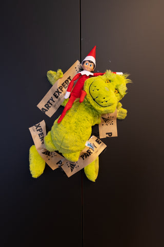 Grinch Encounter: Elf with Grinch Plush Toy