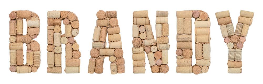 Brandy written with wine  bottle corks