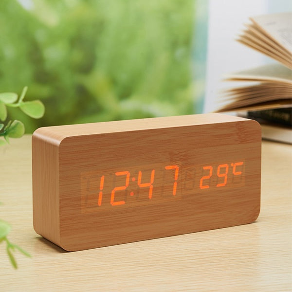 a Yellow Wooden Clock with a LED Display