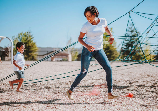 10 Family Activities You've Never Thought to Do. Mother and son running as they do an obstacle course together.