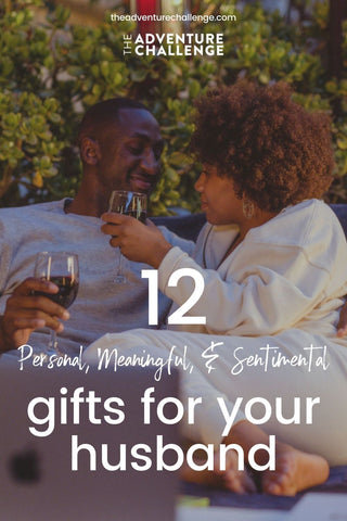 Couple sharing a glass of wine together as they cuddle; image overlaid with text that reads 12 Personal, Meaningful, & Sentimental Gifts for your Husband