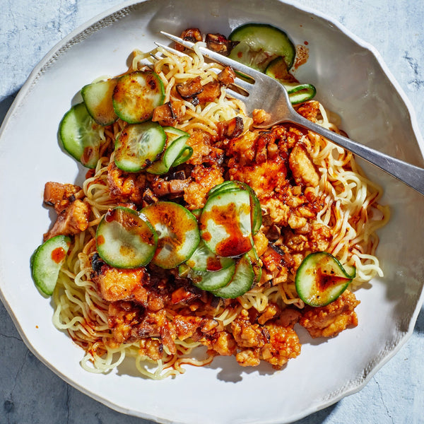 17 Easy dinner Recipe Ideas for Two: Saucy Tofu Noodles with Cucumbers and Chili Crisp.