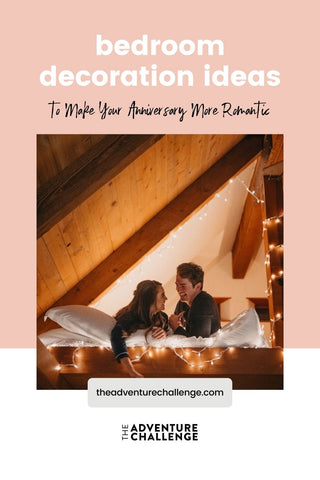 Couple lying in bed together with fairy lights beside them; image overlaid with text that reads Bedroom Decoration Ideas to Make Your Anniversary More Romantic