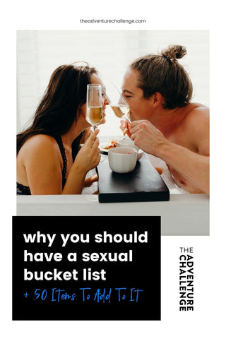 Couple smiling at each other as they toast while having a food date in the bathtub; image overlaid with text that reads Why You Should Have a Sexual Bucket List + 50 Items to Add to It
