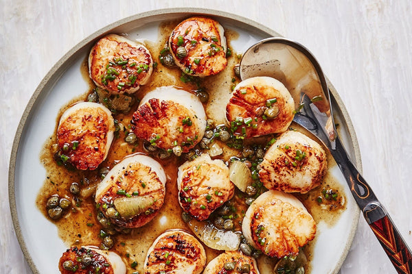 26 Romantic Dinner Recipes to Take Date Night to Another Level: Seared Scallops with Brown Butter and Lemon.