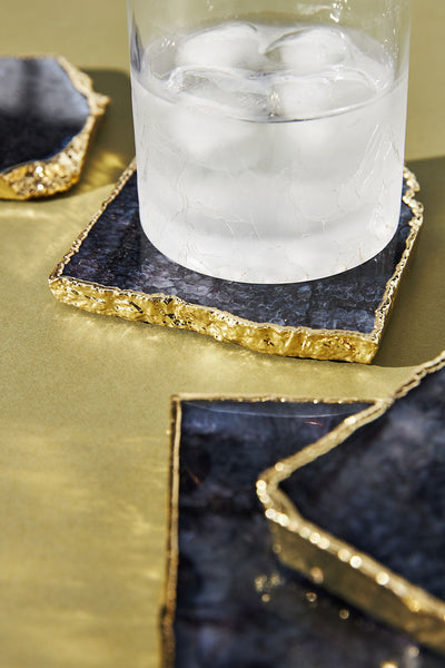 Agate drinks coaster which are rimmed with gold, a perfect home decor gift