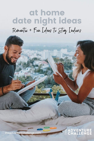 Couple smiling and having a great time while painting together; image overlaid with text that reads At Home Date Night Ideas | Romantic and Fun Ideas to Stay Indoors