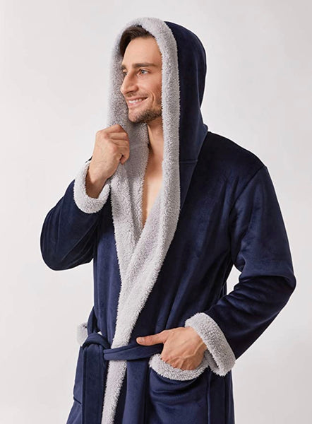 Guy wearing a dark blue fleece bathrobe, a great gift for lounging around in