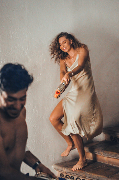 Creative, Romantic, and Fun Stay-at-Home Date Ideas for Couples: Couple playing with nerf guns