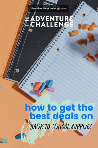 Flat-lay of two spiral notebooks with crayons and fish-shaped crackers against an orange backdrop; image overlaid with text that reads ​​How to Get the Best Deals on Back to School Supplies