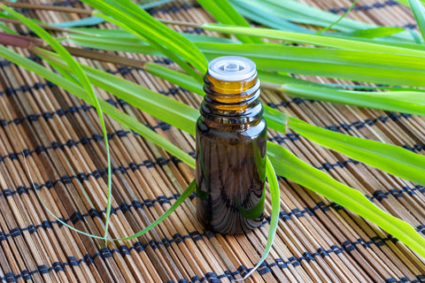 Lemongrass and lemongrass oil on table