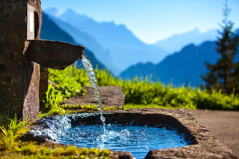 Spring water flowing out of spring