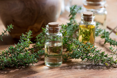 Thyme Essential Oil on Wood