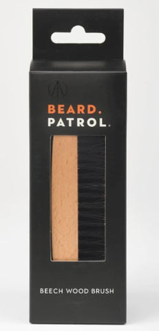 Beard grooming brush.