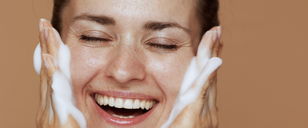 Woman washing her lash extensions 