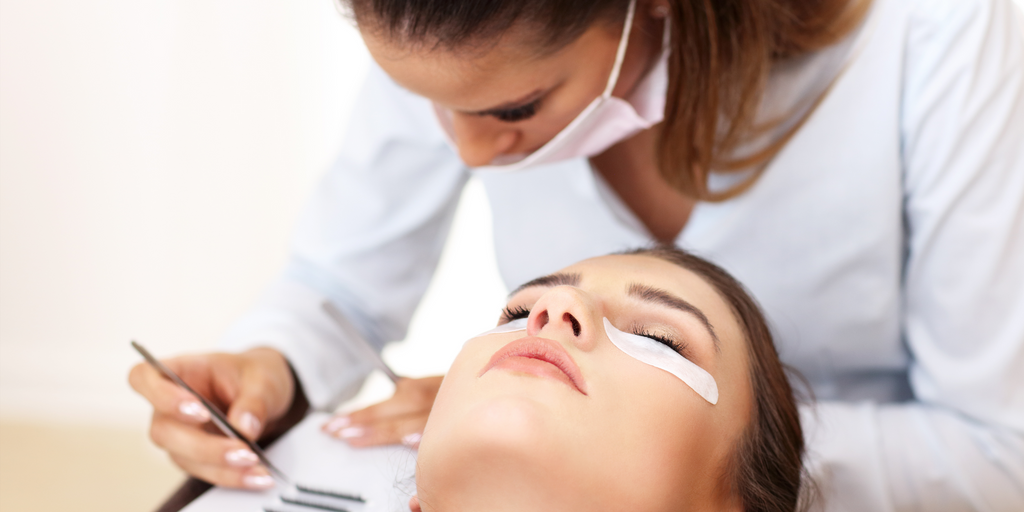 Lash Artist applying a Handmade Fan I Prolong Lash