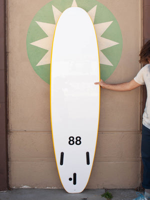 Image of 7'0 88 Surfboard ~ Yellow/White in undefined