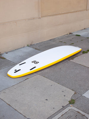 Image of 7'0 88 Surfboard ~ Yellow/White in undefined