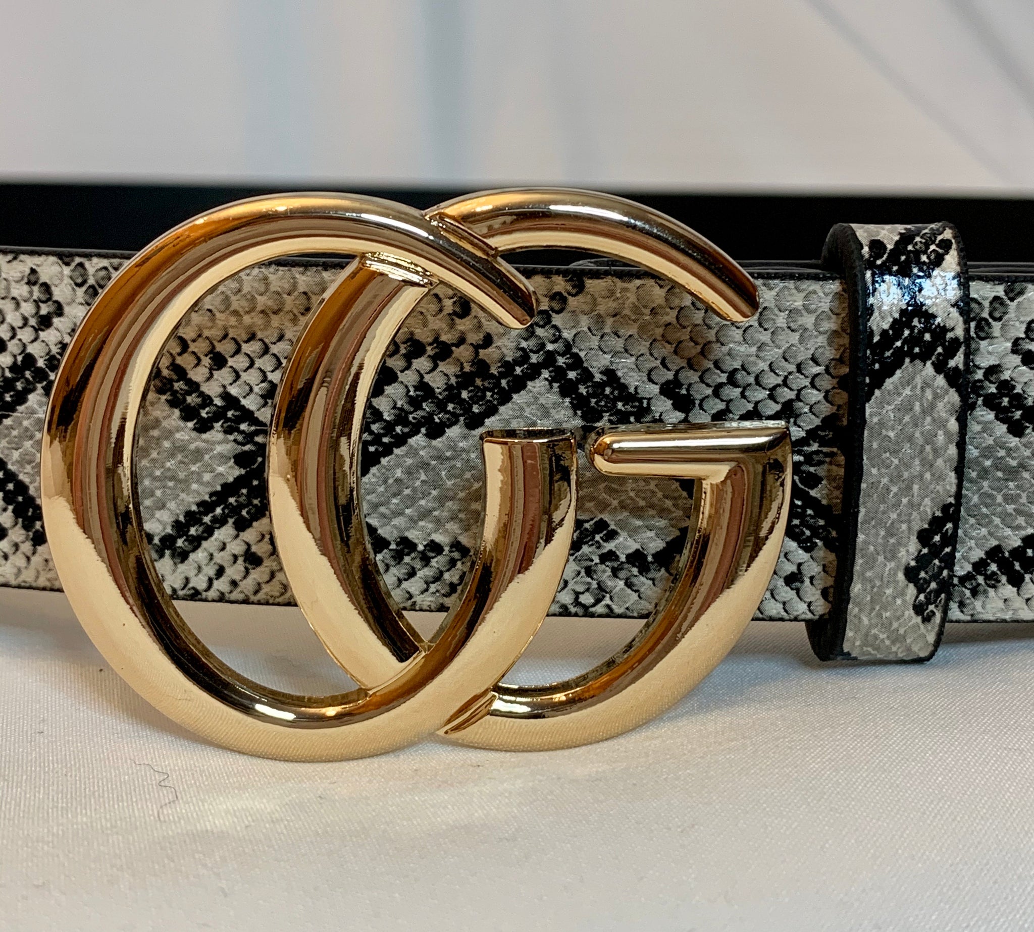 belt with cg on it