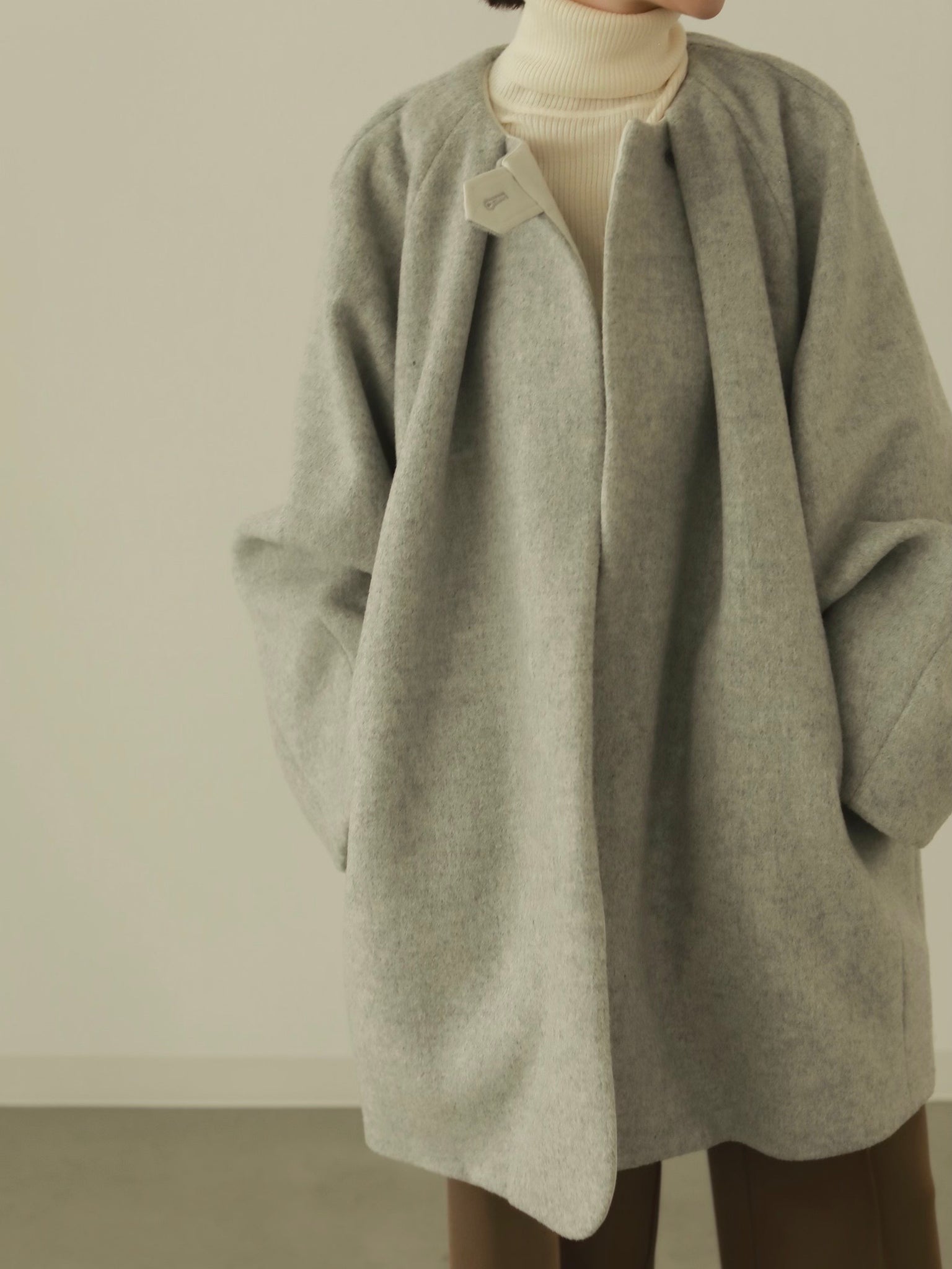 louren volume tack cocoon coat | angeloawards.com