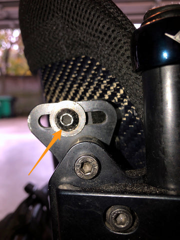 image of a wheelchair screw with a stripped hex head