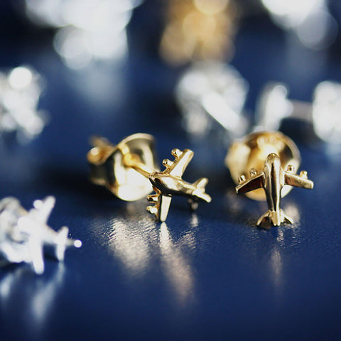 mini gold airplane earrings