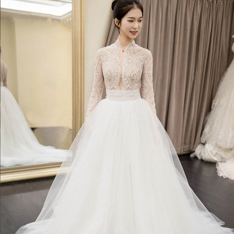 long sleeve lace and tulle wedding dress