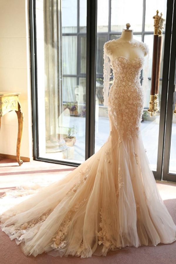 blush pink long sleeve wedding dress