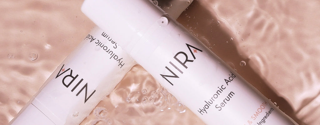 NIRA’s Hyaluronic Acid Serum floating in water