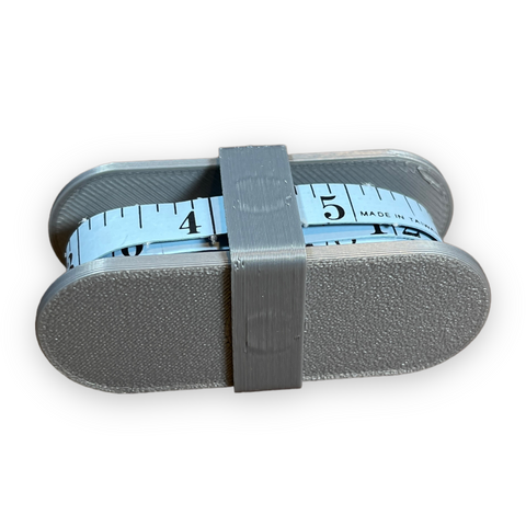 Products Fabric Measuring Tape Holder | Roll up your sewing tape measure with ease with this fabric tape measure holder!