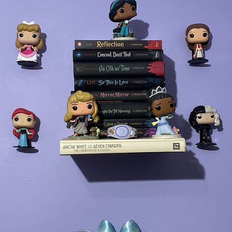 Using command strips to mount funko floating shelves on the wall - funko out of box display shelves