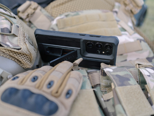 a samsung galaxy s24 ultra rugged case stand on the military gear's surface