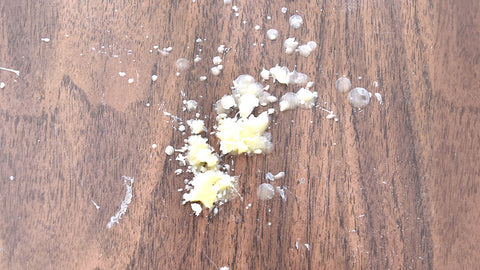 Beeswax spilled on a table