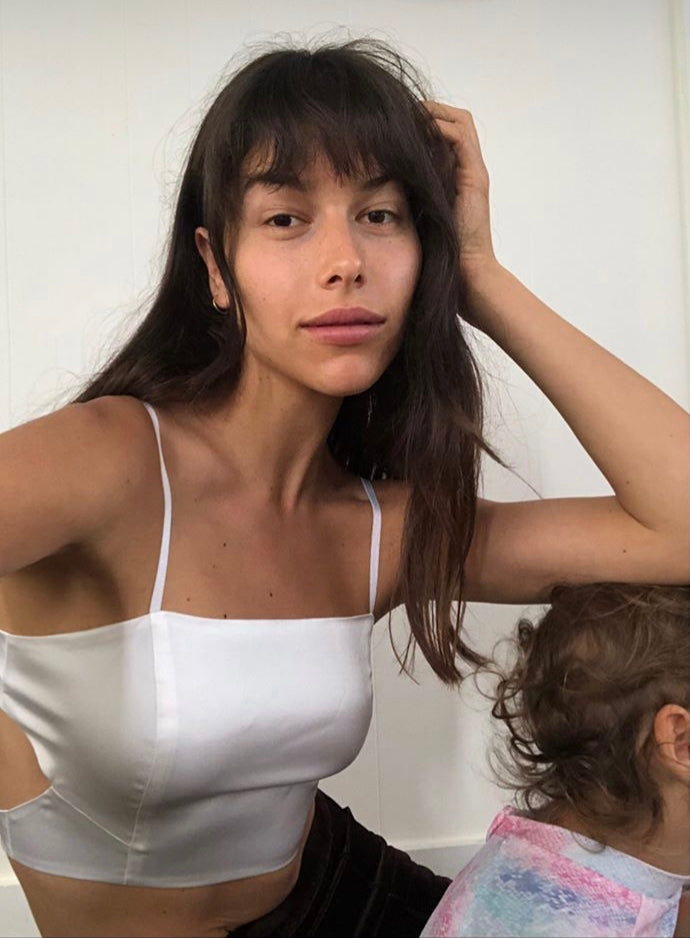 Helena Vestergaard in PRAE Lillie side cut-out silk bralette in white