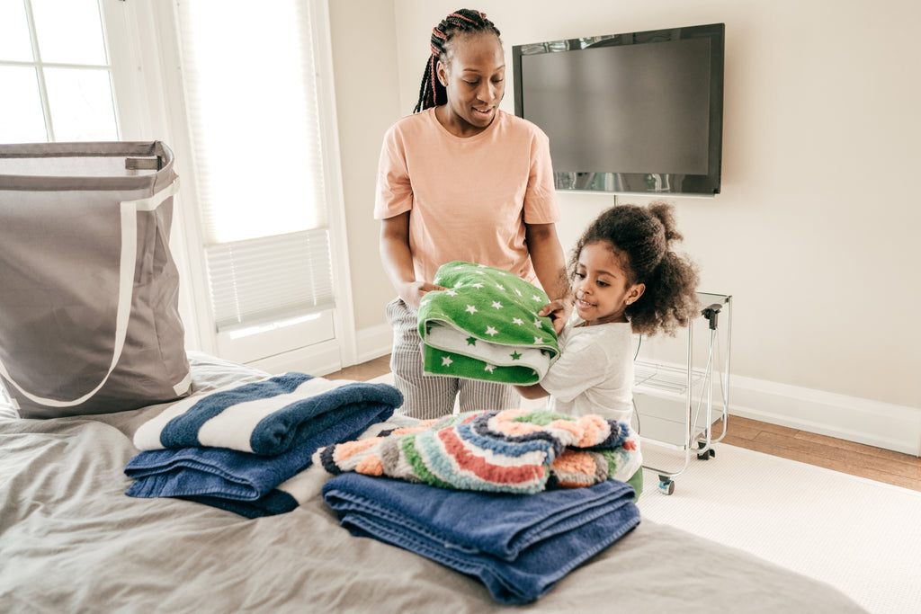 mom and daughter doing chores