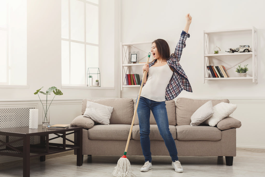 woman excited cleaning