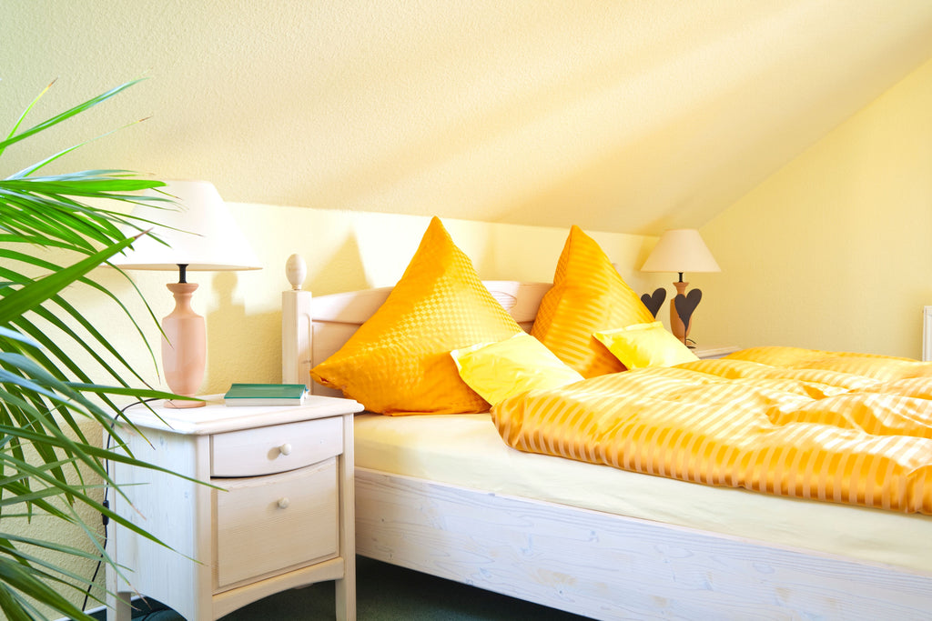 yellow bedroom organized 