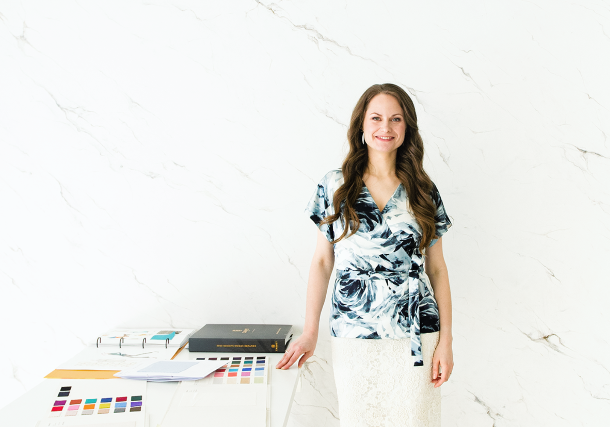 Woman in a silk wrap blouse and a lace skirt