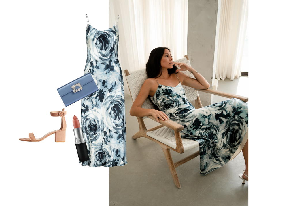 woman wearing a silk slip dress in floral print on vacation