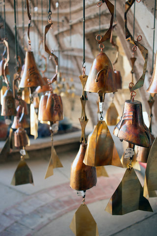 Bronze bells hanging outdoors