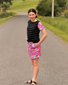 Kendal Set by Emily Rose Designs is beautiful hot pink skirt with a matching stripe black tee with pink floral sleeves 