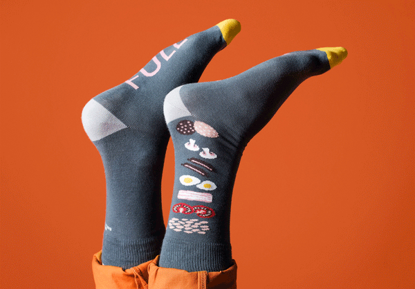 the full irish socks on some  playful upside down feet