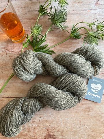 Northern Yarn Coorie with a thistle and glass of Iron Bru