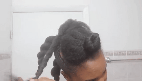 Lady styling her hair Mohawk style 