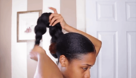 Lady styling hair