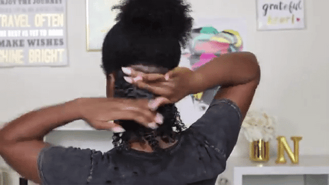 lady applying Mousse to hair
