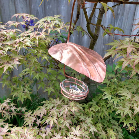 Copper bird feeder