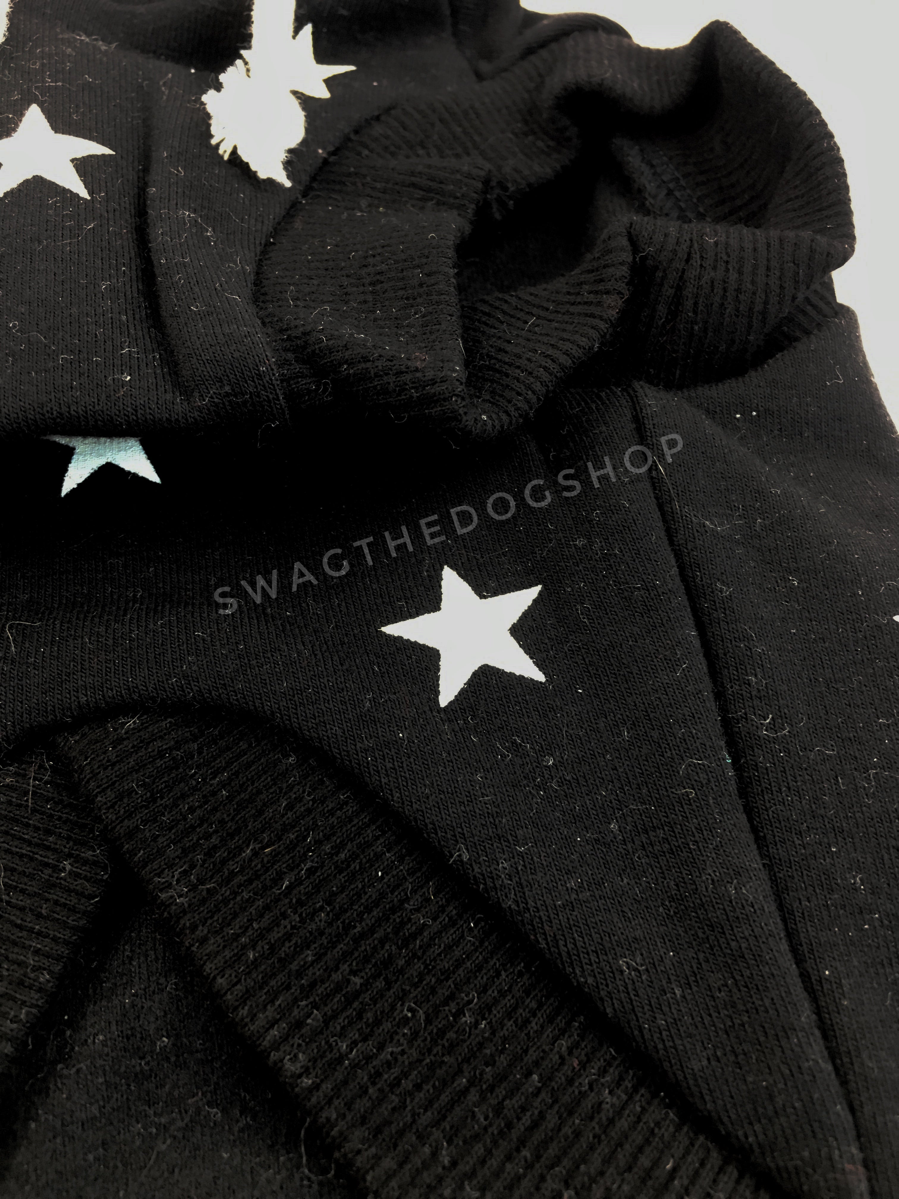 black hoodie with white stars