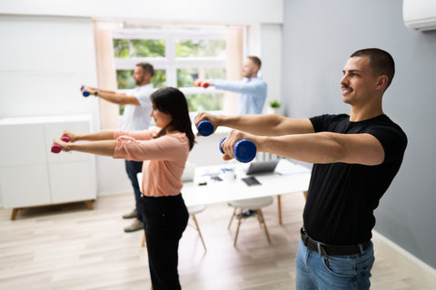 employees exercising for wellness at work